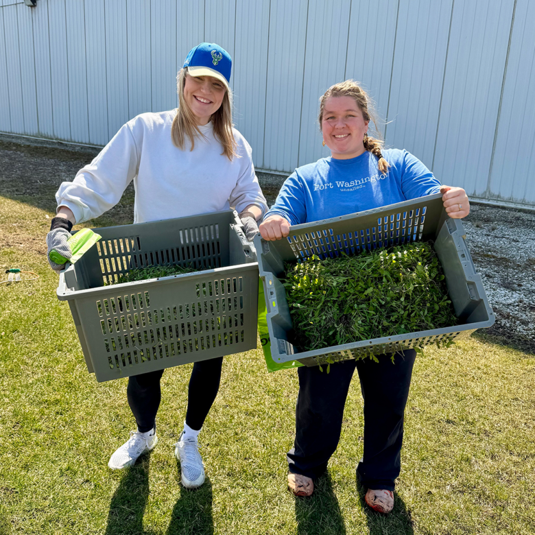 Junior League of Milwaukee volunteering at Kinship Community Center Farm